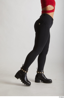  Zuzu Sweet  1 black boots black trousers casual dressed flexing leg side view 0013.jpg
